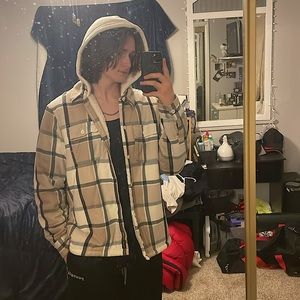 Cream colored flannel hoodie lined in fleece